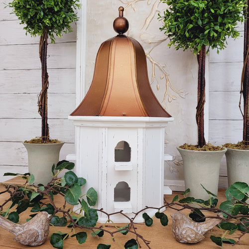 Queen Anne style birdhouse with copper domed roof.
