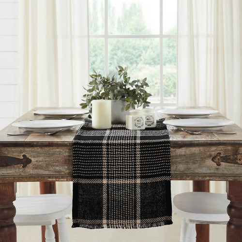 Timeless table setting in black and tan woven tartan plaid table runner.