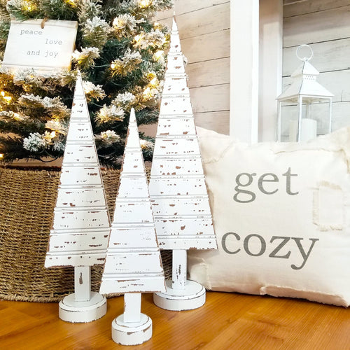 Chippy white beadboard cottage farmhouse Christmas tree accent.