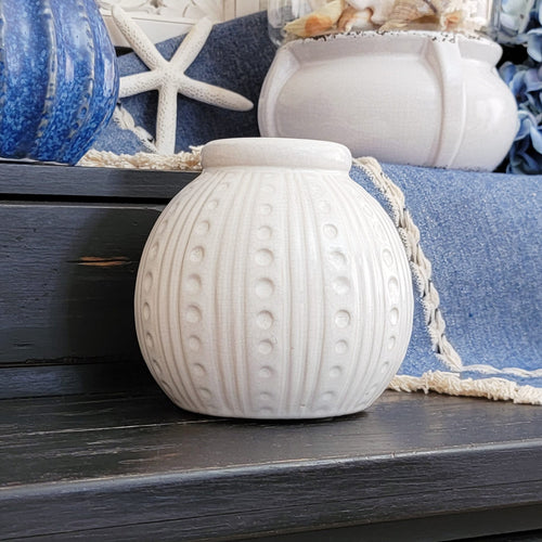 White round urchin vase  in a Coastal home vignette