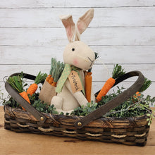 Load image into Gallery viewer, Frederick the bunny doll in a chipwood basket with carrots.
