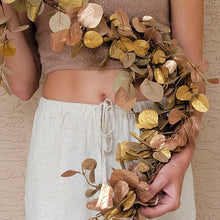 Load image into Gallery viewer, Gold and copper eucalyptus garland.
