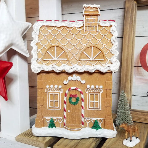 Large resin gingerbread house.