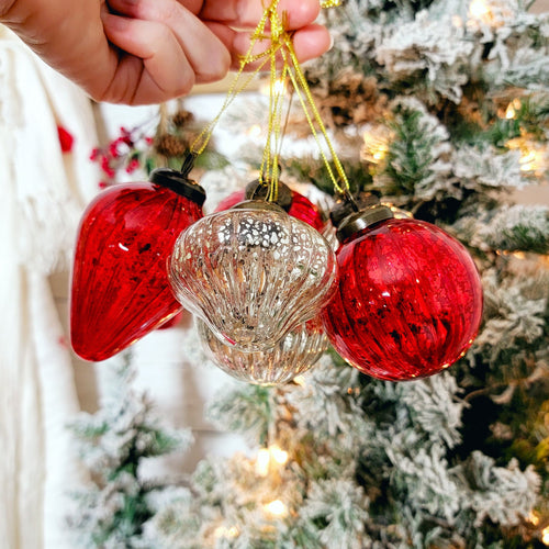 Vintage-inspired red and silver mercury glass ornaments.
