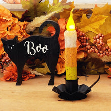 Load image into Gallery viewer, Primitive wax dipped flameless candy corn taper candle and a black wood cat Halloween tabletop decoration

