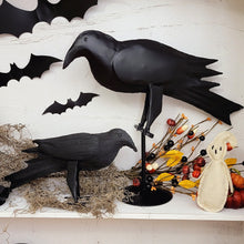 Load image into Gallery viewer, Primitive Halloween display with metal crow figurines and a whimsical fabric ghost.
