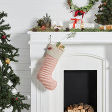 Load image into Gallery viewer, Vintage-Inspired Red Ticking Stripe Christmas Stocking hung on a white fireplace mantel.
