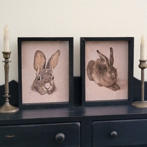 Rustic black framed rabbit print set.