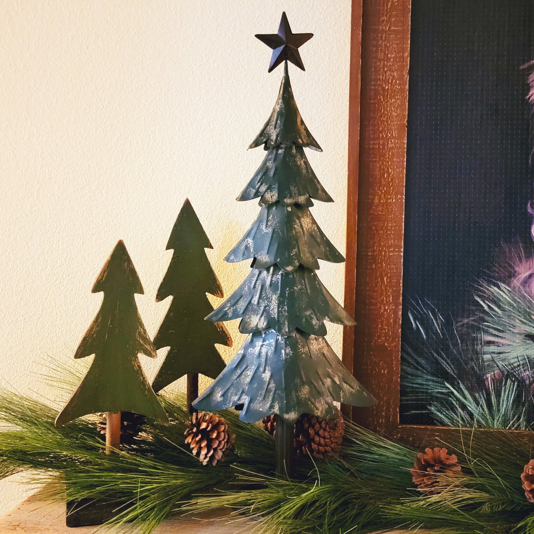 Rustic chippy green metal evergreen pine tree tabletop christmas decor.