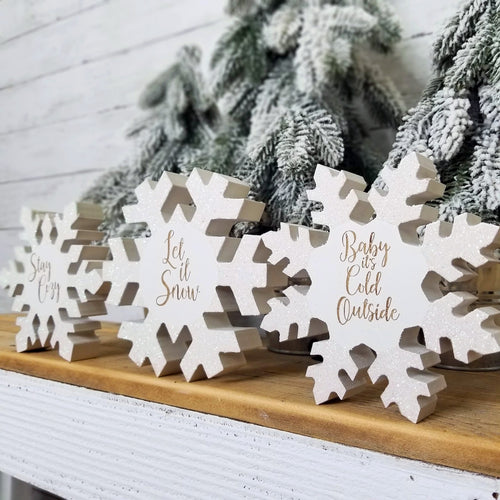 Sparkly white snowflake shaped holiday decor