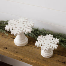 Load image into Gallery viewer, White distressed snowflake shaped wood pedestal risers.
