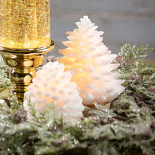 Load image into Gallery viewer, Snowy white glittered pine tree and pinecone flameless led candles.

