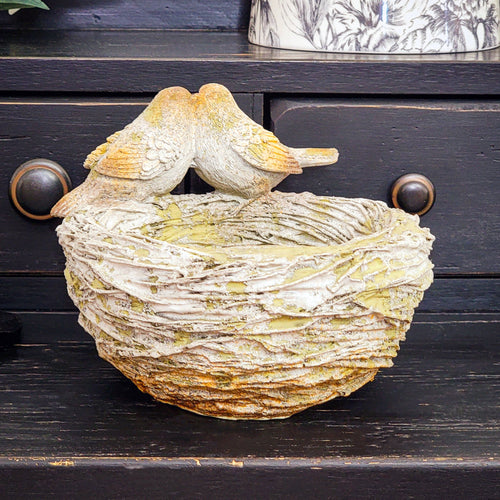 Rustic weathered bird and nest bowl feeder.