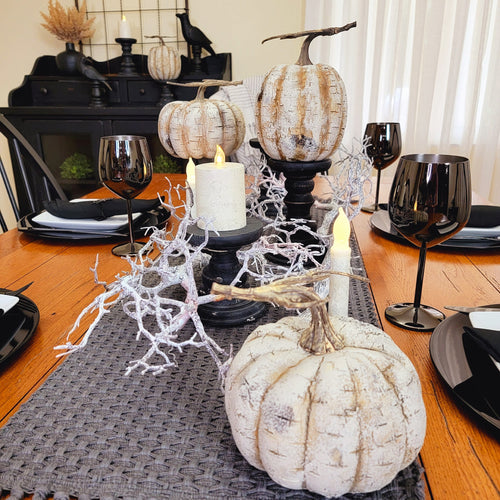 Spooky white birch faux pumpkin Halloween centerpiece.