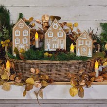 Load image into Gallery viewer, Winter gingerbread wood houses in a wicker basket.
