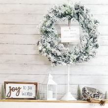 Load image into Gallery viewer, Winter side table display with an antique style adjustable tabletop wreath holder joy to the world wood sign antique style silver santa in his sleigh and white led lantern
