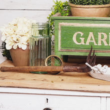 Load image into Gallery viewer, antique green glass flower frog and rustic garden hand rake
